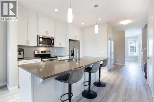 46 Evanston Hill Nw, Calgary, AB - Indoor Photo Showing Kitchen With Double Sink With Upgraded Kitchen
