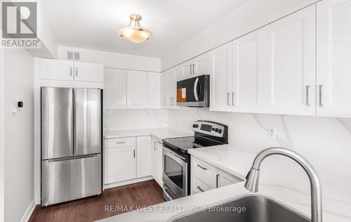 1510 - 50 Eglinton Avenue W, Mississauga, ON - Indoor Photo Showing Kitchen With Upgraded Kitchen