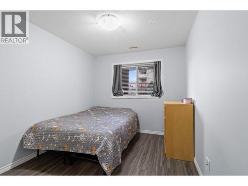 Bedroom #2 - 1966 Durnin Road Unit# 105, Kelowna, BC - Indoor Photo Showing Bedroom