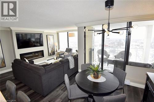 75 Queen Street N Unit# 1707, Hamilton, ON - Indoor Photo Showing Dining Room With Fireplace