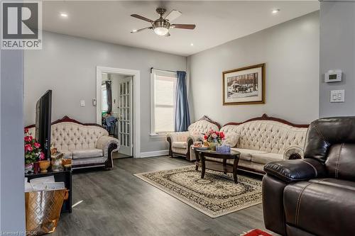 Living area featuring wood finished floors, recessed lighting, and ceiling fan - 126 Tisdale Street N, Hamilton, ON - Indoor Photo Showing Living Room