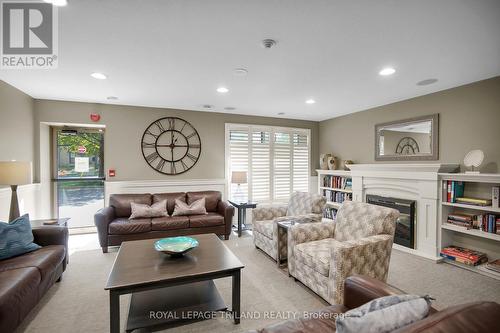 1206 - 250 Pall Mall Street, London East (East F), ON - Indoor Photo Showing Living Room With Fireplace