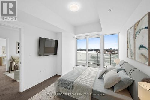 This photograph has been virtually staged. - 906 - 805 Carling Avenue, Ottawa, ON - Indoor Photo Showing Bedroom