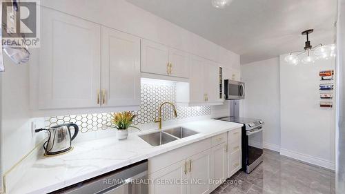 1219 - 551 The West Mall, Toronto, ON - Indoor Photo Showing Kitchen With Double Sink