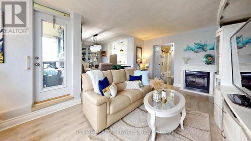 1219 - 551 The West Mall, Toronto, ON - Indoor Photo Showing Living Room With Fireplace