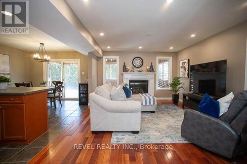 18 Gaal Court, Brantford, ON - Indoor Photo Showing Living Room With Fireplace
