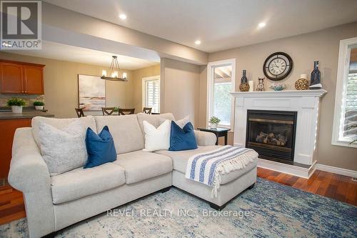 18 Gaal Court, Brantford, ON - Indoor Photo Showing Living Room With Fireplace