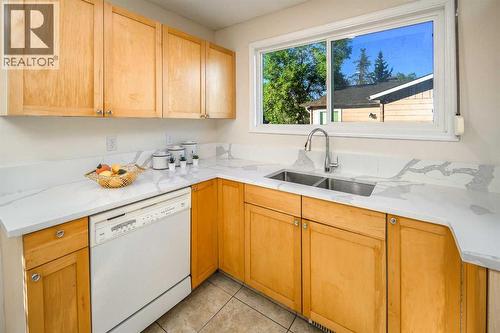 20 Bernard Way Nw, Calgary, AB - Indoor Photo Showing Kitchen With Double Sink