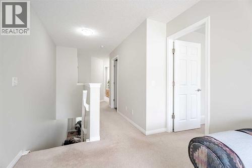 3005 Windsong Boulevard Sw, Airdrie, AB - Indoor Photo Showing Bedroom
