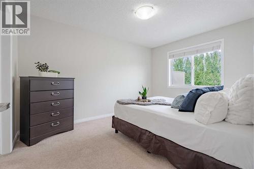 3005 Windsong Boulevard Sw, Airdrie, AB - Indoor Photo Showing Bedroom
