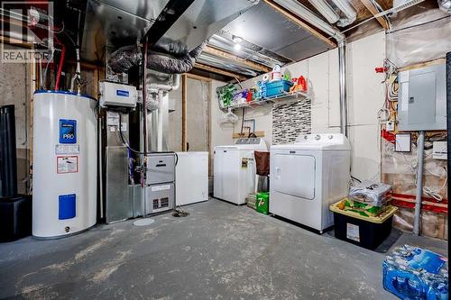 3005 Windsong Boulevard Sw, Airdrie, AB - Indoor Photo Showing Laundry Room