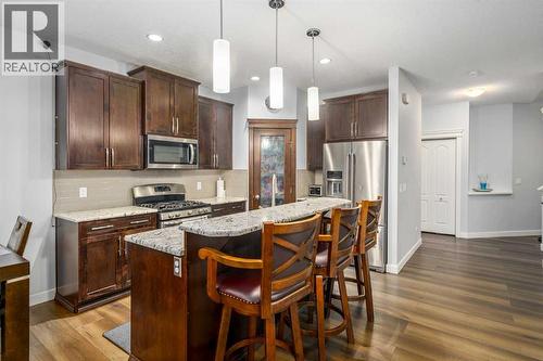 254 Silverado Plains Circle Sw, Calgary, AB - Indoor Photo Showing Kitchen With Upgraded Kitchen