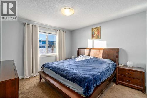 254 Silverado Plains Circle Sw, Calgary, AB - Indoor Photo Showing Bedroom