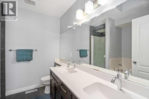 254 Silverado Plains Circle Sw, Calgary, AB - Indoor Photo Showing Bathroom
