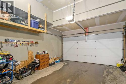 254 Silverado Plains Circle Sw, Calgary, AB - Indoor Photo Showing Garage