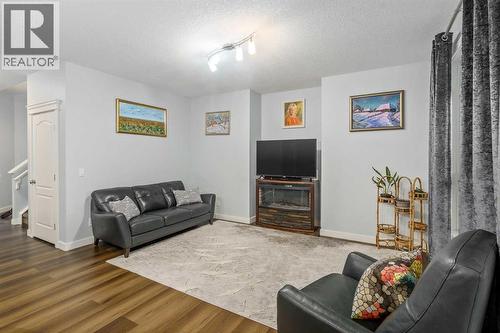 254 Silverado Plains Circle Sw, Calgary, AB - Indoor Photo Showing Living Room