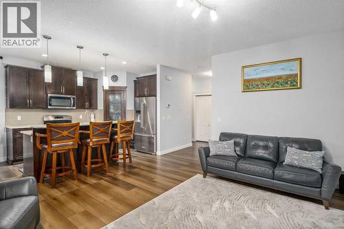 254 Silverado Plains Circle Sw, Calgary, AB - Indoor Photo Showing Living Room