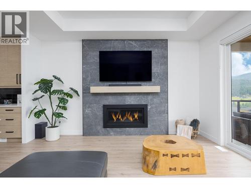 137 Whitefish Road, Vernon, BC - Indoor Photo Showing Living Room With Fireplace