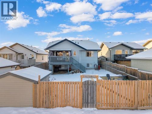 Fully Fenced with RV Gate - 10 Wilkinson Circle, Sylvan Lake, AB - Outdoor With Deck Patio Veranda