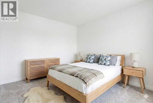 Bedroom 2 - 33 Douglasbank Rise Se, Calgary, AB - Indoor Photo Showing Bedroom