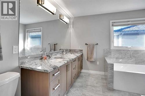 Master Bath - 33 Douglasbank Rise Se, Calgary, AB - Indoor Photo Showing Bathroom