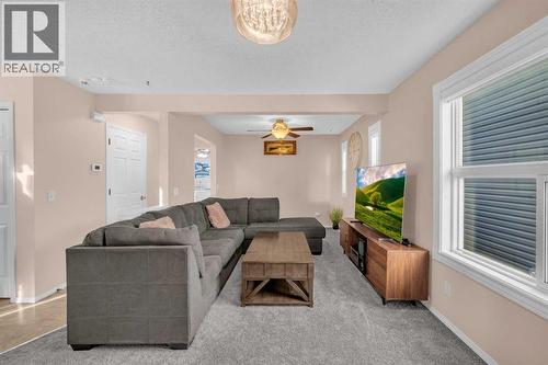 131 Coral Springs Circle Ne, Calgary, AB - Indoor Photo Showing Living Room