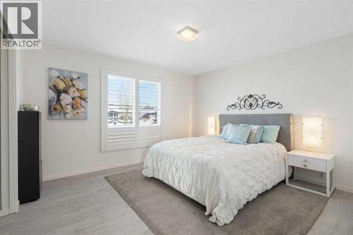 201 Harvest Creek Close Ne, Calgary, AB - Indoor Photo Showing Bedroom