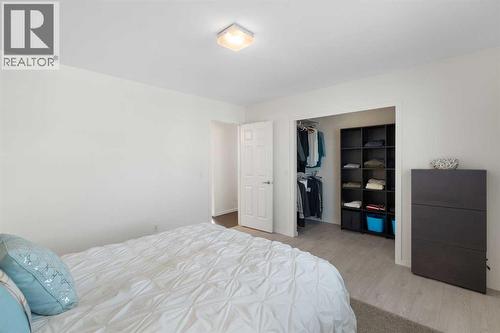 201 Harvest Creek Close Ne, Calgary, AB - Indoor Photo Showing Bedroom