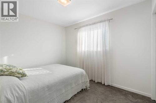 201 Harvest Creek Close Ne, Calgary, AB - Indoor Photo Showing Bedroom