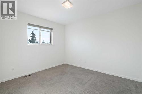 201 Harvest Creek Close Ne, Calgary, AB - Indoor Photo Showing Other Room