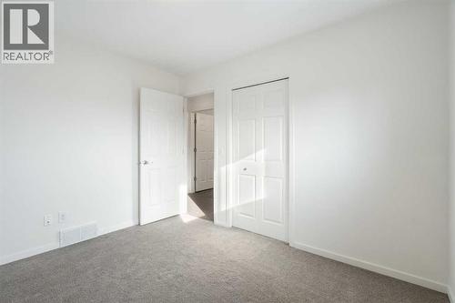 201 Harvest Creek Close Ne, Calgary, AB - Indoor Photo Showing Other Room