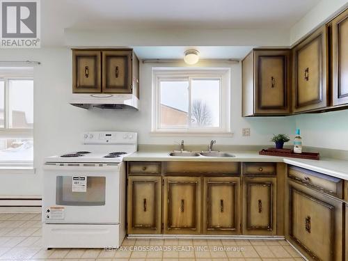 #23 - 90 Crockamhill Drive, Toronto, ON - Indoor Photo Showing Kitchen With Double Sink