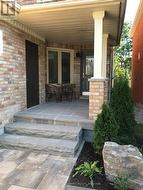 Prof Landscaped, Stone Entrance with Garage Access - 