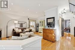 Spacious Living Room with Hardwood Flooring - 