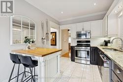 Stainless Steel Appliances & Stone Counters - 