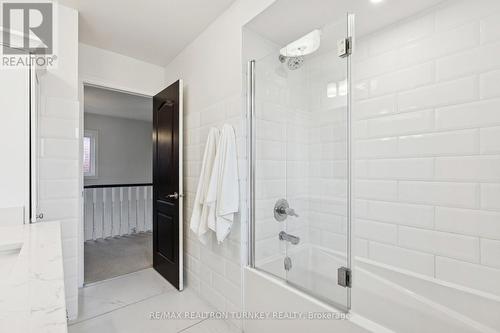 Upgraded Glass Sliding door & subway tile - 407 Seneca Court, Newmarket, ON - Indoor Photo Showing Bathroom