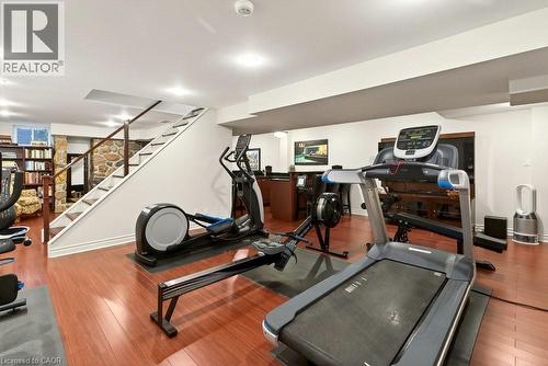 Stairs to the open Rec Room/Home Gym and Family Room - 29 Woodside Drive, Hamilton, ON - Indoor Photo Showing Gym Room