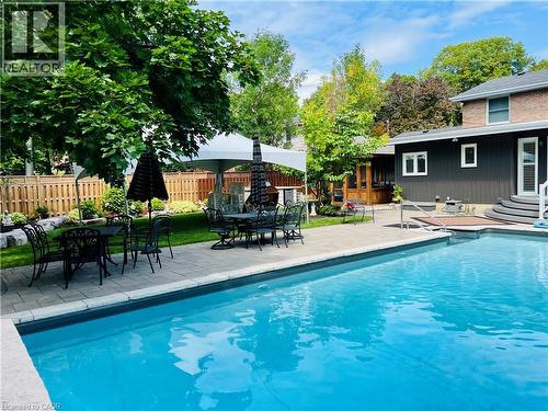 Breathtaking backyard! Entertain in style and even for special events & large gatherings. - 29 Woodside Drive, Hamilton, ON - Outdoor With In Ground Pool With Deck Patio Veranda With Backyard