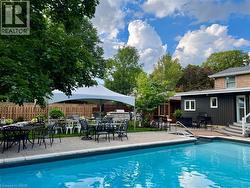 the Outdoor kitchen and the Gazebo are close to the patio with large umbrella! - 