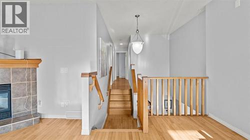 158 Covemeadow Road Ne, Calgary, AB - Indoor Photo Showing Other Room With Fireplace