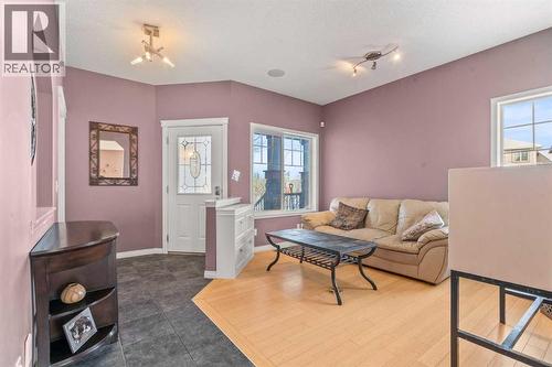 15 Chapalina Close Se, Calgary, AB - Indoor Photo Showing Living Room