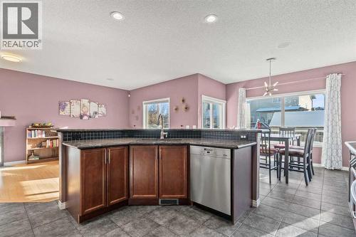 15 Chapalina Close Se, Calgary, AB - Indoor Photo Showing Kitchen
