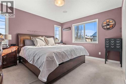 15 Chapalina Close Se, Calgary, AB - Indoor Photo Showing Bedroom
