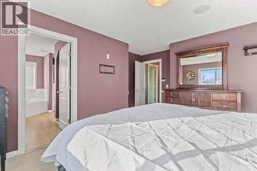 15 Chapalina Close Se, Calgary, AB - Indoor Photo Showing Bedroom