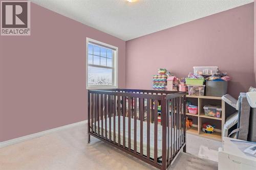 15 Chapalina Close Se, Calgary, AB - Indoor Photo Showing Bedroom
