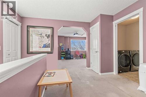 15 Chapalina Close Se, Calgary, AB - Indoor Photo Showing Laundry Room