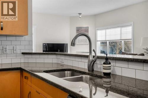 1101, 281 Cougar Ridge Drive Sw, Calgary, AB - Indoor Photo Showing Kitchen With Double Sink