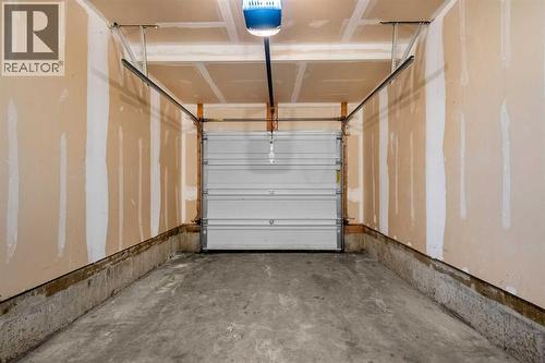 1101, 281 Cougar Ridge Drive Sw, Calgary, AB - Indoor Photo Showing Garage