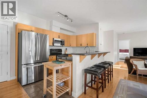 1101, 281 Cougar Ridge Drive Sw, Calgary, AB - Indoor Photo Showing Kitchen With Stainless Steel Kitchen