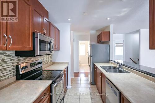 25 - 318 Little Avenue, Barrie, ON - Indoor Photo Showing Kitchen With Double Sink
